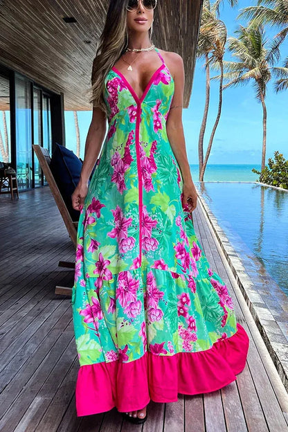 Vestido de verão elegante com estampa fashion, modelagem slim, decote V profundo e alças halter, ideal para festas e praia.