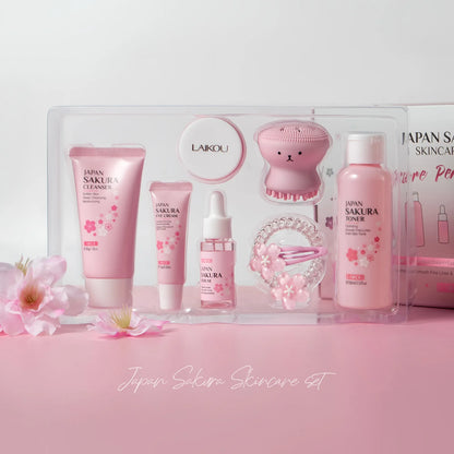 Conjunto de 8 peças de cuidados com a pele Sakura: Limpador facial, tônico, essência, creme para os olhos, creme essência, presilha de cabelo, elástico de cabelo, polvo rosa.