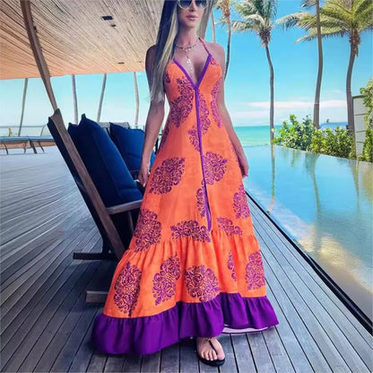 Vestido de verão elegante com estampa fashion, modelagem slim, decote V profundo e alças halter, ideal para festas e praia.